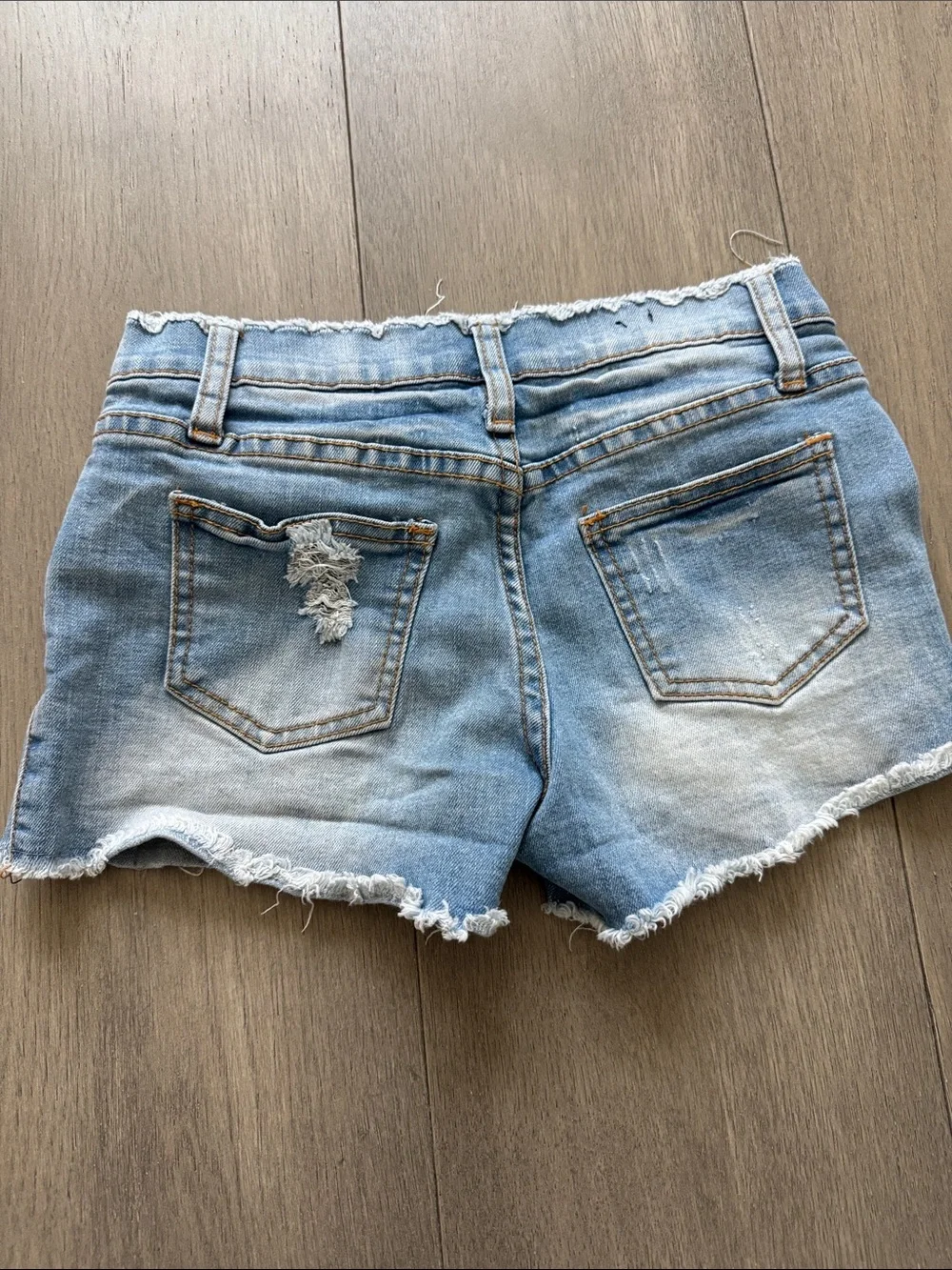 Kids Light Blue Distressed Denim Shorts by CONTRASTA